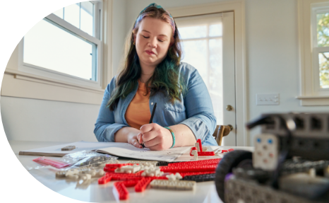 Image of woman writing