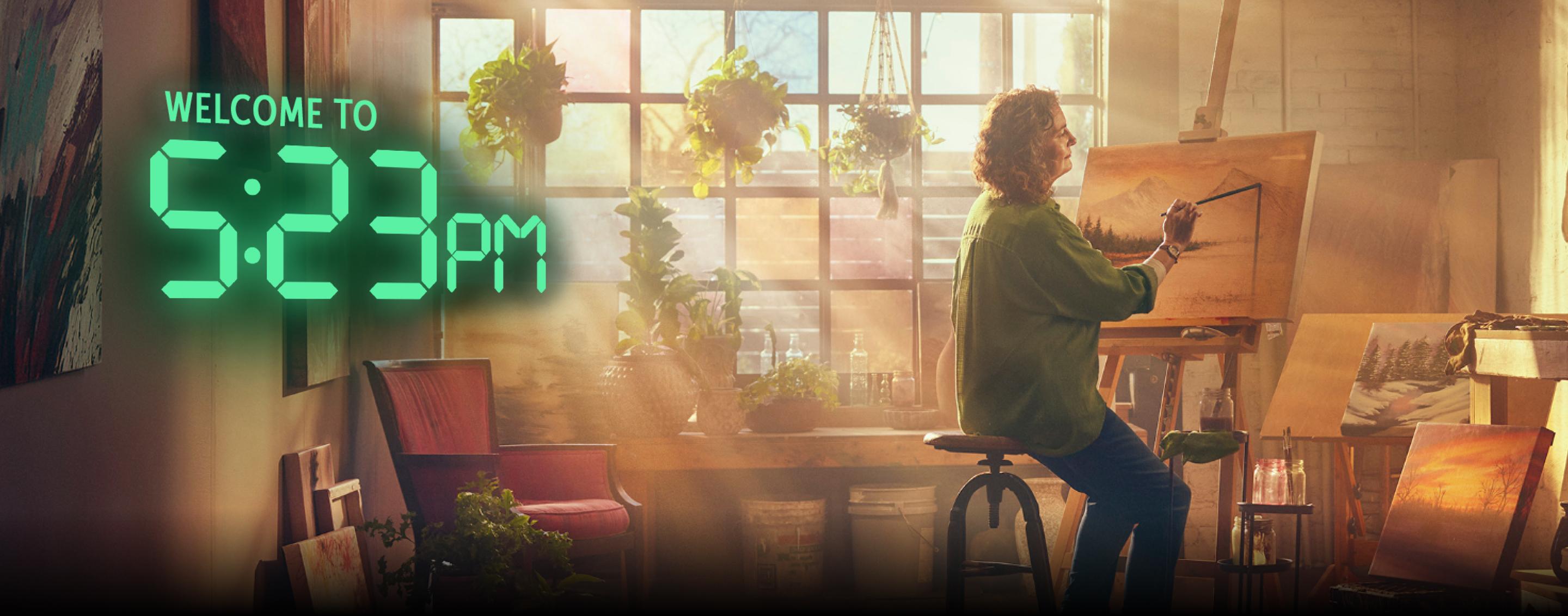 A woman painting in a studio with the text, "Welcome to 5:23 PM. With extended-release Lumryz, patients with Narcolepsy can be awake for more daytime moments."